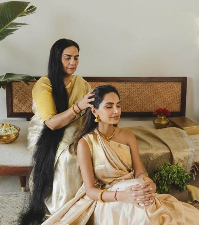 Traditional Indian hair oiling ritual with VKZ Ancient Ayurveda Hair Oil